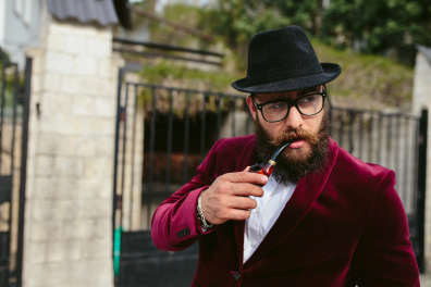 1 close-up-man-posing-with-pipe.png